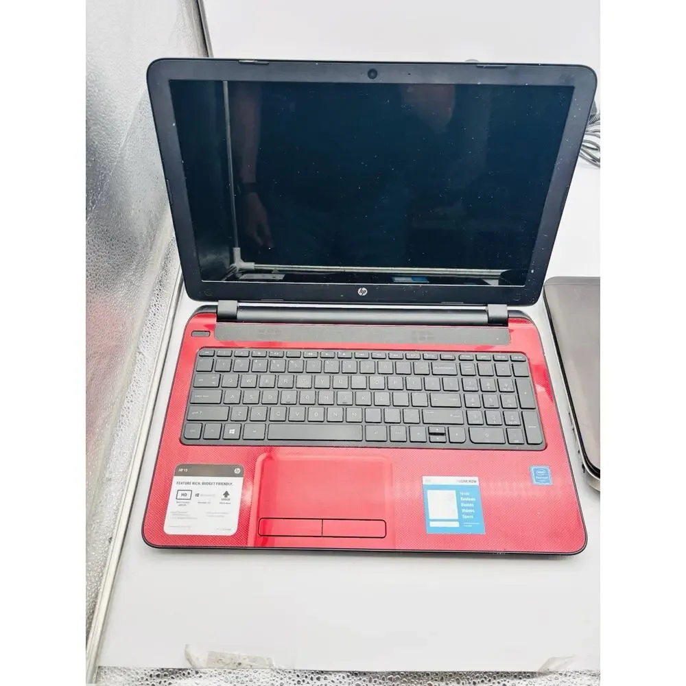 3 HP Laptop Computers With Cords. And 1 Samsung Laptop For Parts And Repair.